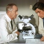 Marcus Welby and Steven Kiley at microscope